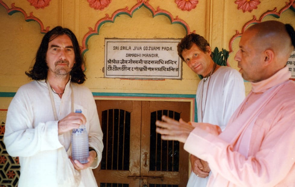 George Harrison, Shyamasundara Dasa, and Mukunda Goswami in Vrindavan in front of Jiva Goswami Samadhi, 1996